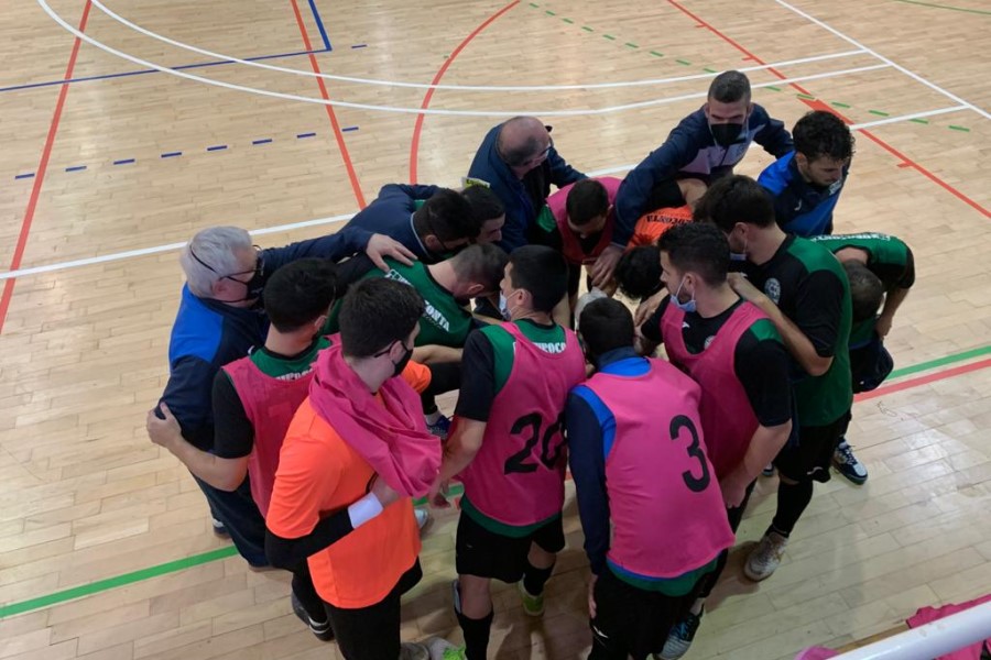 L'equip fent pinya (Club Futbol Sala Lloret)