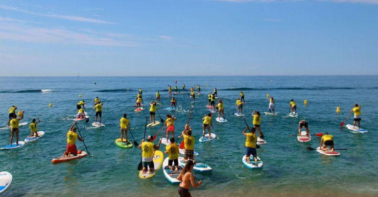 60 participants a la primera cursa de paddle surf a la platja de Lloret